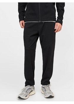 Jack&Jones Spodnie dresowe Will 12253727 Czarny Slim Fit ze sklepu MODIVO w kategorii Spodnie męskie - zdjęcie 181194186