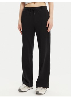 Converse Spodnie dresowe 10028418-A03 Czarny Wide Leg ze sklepu MODIVO w kategorii Spodnie damskie - zdjęcie 181194278