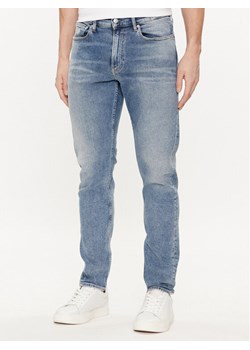 Calvin Klein Jeans Jeansy J30J324844 Niebieski Slim Fit ze sklepu MODIVO w kategorii Jeansy męskie - zdjęcie 181195238