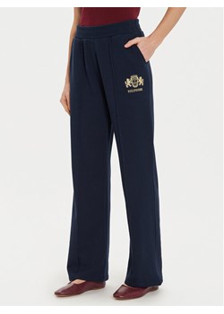 Tommy Hilfiger Spodnie dresowe Varsity WW0WW43862 Granatowy Regular Fit ze sklepu MODIVO w kategorii Spodnie damskie - zdjęcie 181195677