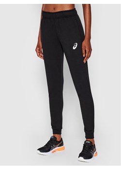 Asics Spodnie dresowe Big Logo 2032A982 Czarny Regular Fit ze sklepu MODIVO w kategorii Spodnie damskie - zdjęcie 181195777