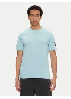 Calvin Klein Jeans T-Shirt J30J323484 Zielony Regular Fit ze sklepu MODIVO w kategorii T-shirty męskie - zdjęcie 181196529
