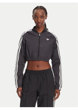 adidas Bluza adicolor Teamgeist JD0264 Czarny Slim Fit ze sklepu MODIVO w kategorii Bluzy damskie - zdjęcie 181196885