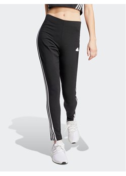adidas Legginsy Future Icons 3-Stripes IP1570 Czarny Slim Fit ze sklepu MODIVO w kategorii Spodnie damskie - zdjęcie 181198337