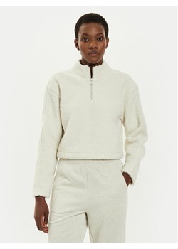 Calvin Klein Performance Bluza 00GWF4W307 Beżowy Regular Fit ze sklepu MODIVO w kategorii Bluzy damskie - zdjęcie 181199588