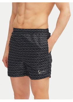 Karl Kani Szorty kąpielowe Signature Monogram Aop 60550022 Czarny Regular Fit ze sklepu MODIVO w kategorii Kąpielówki - zdjęcie 181199895