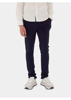 Guess Spodnie materiałowe L4RB05 KC3G0 Granatowy Regular Fit - id: 0000303373948 - marki Guess - 181201286 Guess Spodnie materiałowe L4RB05 KC3G0 Granatowy Regular Fit ze sklepu MODIVO w kategorii Spodnie chłopięce - zdjęcie 181201286