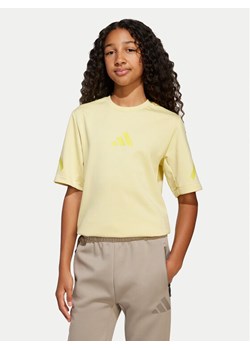 adidas T-Shirt Z.N.E. JD0015 Żółty Loose Fit ze sklepu MODIVO w kategorii Bluzki dziewczęce - zdjęcie 181202136