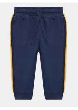 United Colors Of Benetton Spodnie dresowe 3J68GF02T Granatowy Regular Fit ze sklepu MODIVO w kategorii Spodnie chłopięce - zdjęcie 181203059
