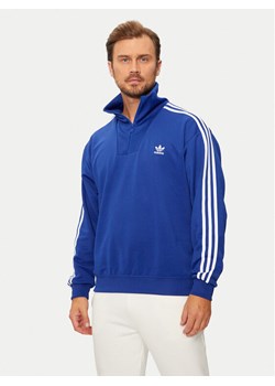 adidas Bluza adicolor Funnel IX5216 Niebieski Regular Fit ze sklepu MODIVO w kategorii Bluzy męskie - zdjęcie 181203166