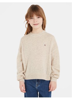 Tommy Hilfiger Sweter Essential KG0KG07801 Beżowy Regular Fit ze sklepu MODIVO w kategorii Swetry dziewczęce - zdjęcie 181203406