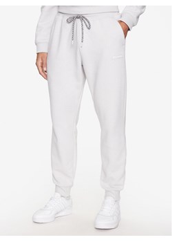 Columbia Spodnie dresowe Marble Canyon™ Heavyweight Fleece Pant Szary Regular Fit ze sklepu MODIVO w kategorii Spodnie męskie - zdjęcie 181204285