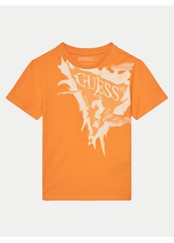 Guess T-Shirt L5GI20 K8HM4 Pomarańczowy Regular Fit ze sklepu MODIVO w kategorii T-shirty chłopięce - zdjęcie 181205728