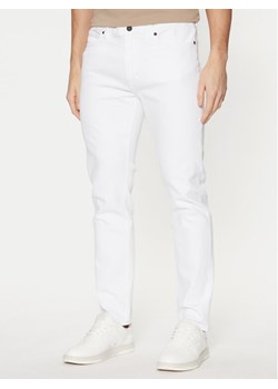 HUGO Jeansy 50530605 Biały Slim Fit ze sklepu MODIVO w kategorii Jeansy męskie - zdjęcie 181206246