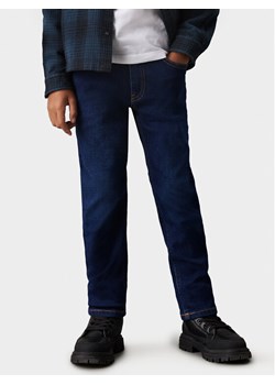 Calvin Klein Jeans Jeansy Authentic IB0IB02188 Granatowy Regular Fit ze sklepu MODIVO w kategorii Spodnie chłopięce - zdjęcie 181207807