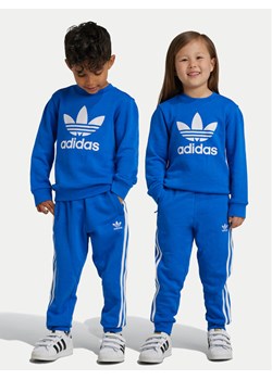 adidas Dres adicolor IY4782 Niebieski Regular Fit ze sklepu MODIVO w kategorii Dresy chłopięce - zdjęcie 181207817