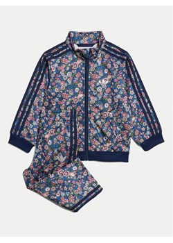 adidas Dres Liberty London Firebird JC8032 Granatowy Regular Fit ze sklepu MODIVO w kategorii Dresy dla niemowlaka - zdjęcie 181207945