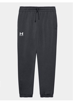 Under Armour Spodnie dresowe UA Rival Terry Jogger 1377021 Czarny Regular Fit ze sklepu MODIVO w kategorii Spodnie chłopięce - zdjęcie 181208135