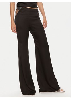 ROTATE Spodnie materiałowe Malou 112538100 Czarny Slim Fit ze sklepu MODIVO w kategorii Spodnie damskie - zdjęcie 181208588