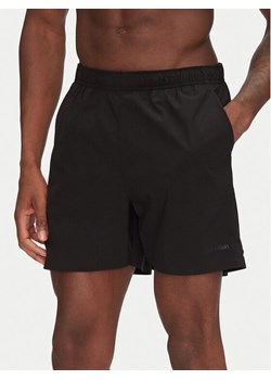 Calvin Klein Swimwear Szorty kąpielowe KM0KM01118 Czarny Regular Fit ze sklepu MODIVO w kategorii Kąpielówki - zdjęcie 181208627