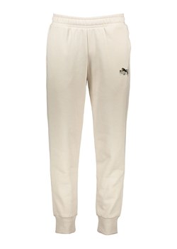Puma Spodnie dresowe &quot;Essentials+&quot; w kolorze beżowym ze sklepu Limango Polska w kategorii Spodnie męskie - zdjęcie 181211398