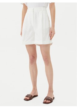 Tommy Hilfiger Szorty materiałowe WW0WW47213 Écru Regular Fit ze sklepu MODIVO w kategorii Szorty - zdjęcie 181216259