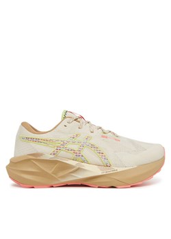 Asics Buty do biegania Novablast 5 Tr 1012B809 Beżowy ze sklepu MODIVO w kategorii Buty sportowe damskie - zdjęcie 181216328