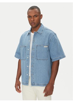 Calvin Klein Jeans Koszula jeansowa Bowler J30J327512 Niebieski Relaxed Fit ze sklepu MODIVO w kategorii Koszule męskie - zdjęcie 181226756