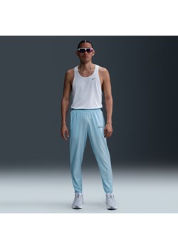 Męskie spodnie do biegania z tkaniny Dri-FIT Nike Challenger Flash - Niebieski ze sklepu Nike poland w kategorii Spodnie męskie - zdjęcie 181235736