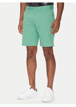 Tommy Hilfiger Szorty materiałowe Brooklyn MW0MW23563 Zielony Regular Fit ze sklepu MODIVO w kategorii Spodenki męskie - zdjęcie 181238386
