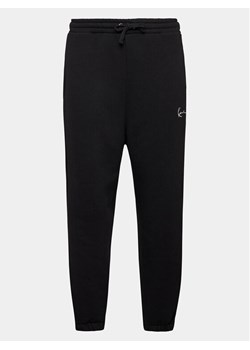 Karl Kani Spodnie dresowe Small Signature Essential 6006898 Czarny Regular Fit ze sklepu MODIVO w kategorii Spodnie męskie - zdjęcie 181238426