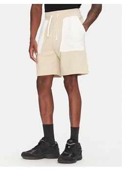 The North Face Szorty sportowe Terry NF0A8C29 Beżowy Regular Fit ze sklepu MODIVO w kategorii Spodenki męskie - zdjęcie 181244309