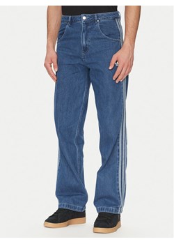 adidas Jeansy adicolor Denim Firebird JC6234 Niebieski Straight Fit ze sklepu MODIVO w kategorii Jeansy męskie - zdjęcie 181244347