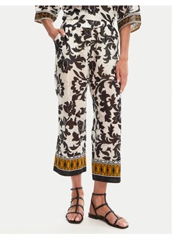Devotion TWINS Spodnie materiałowe Stigma 025.403G Czarny Loose Fit ze sklepu MODIVO w kategorii Spodnie damskie - zdjęcie 181887186