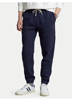 Polo Ralph Lauren Spodnie dresowe 710793939003 Granatowy Relaxed Fit ze sklepu MODIVO w kategorii Spodnie męskie - zdjęcie 181893339