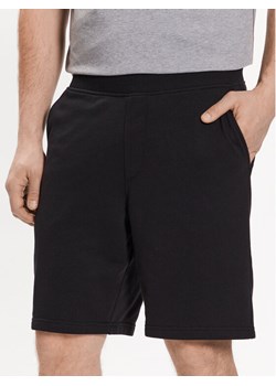 Skechers Szorty sportowe Explorer M1SH69 Czarny Regular Fit ze sklepu MODIVO w kategorii Spodenki męskie - zdjęcie 181893825