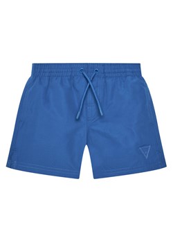 Guess Szorty kąpielowe L5GZ05 WG282 Niebieski Regular Fit ze sklepu MODIVO w kategorii Kąpielówki chłopięce - zdjęcie 181894299