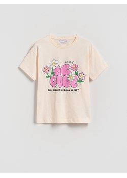 Reserved - Luźny t-shirt z nadrukiem - kremowy ze sklepu Reserved w kategorii Bluzki dziewczęce - zdjęcie 181915579