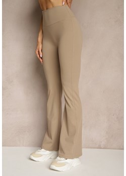 Beżowe Legginsy Dzwony High Waist Orruvana - id: LM88168-2-475-TAUPE - marki Renee - 181938909 Beżowe Legginsy Dzwony High Waist Orruvana ze sklepu renee.pl w kategorii Spodnie damskie - zdjęcie 181938909