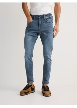 Reserved - Jeansy skinny z efektem sprania - indigo jeans ze sklepu Reserved w kategorii Jeansy męskie - zdjęcie 181941695