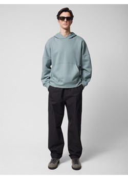 Męskie spodnie cargo Outhorn OTHWSS24TTROM637 - czarne ze sklepu Sportstylestory.com w kategorii Spodnie męskie - zdjęcie 181999217