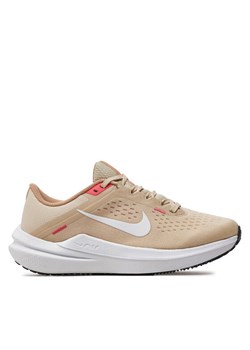 Buty do biegania Nike Air Winflo 10 DV4023 100 Beżowy ze sklepu eobuwie.pl w kategorii Buty sportowe damskie - zdjęcie 182103545