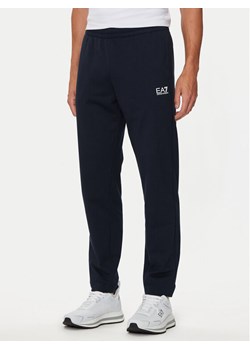 EA7 Emporio Armani Spodnie dresowe 8NPP65 PJVRZ 1562 Granatowy Regular Fit ze sklepu MODIVO w kategorii Spodnie męskie - zdjęcie 182594667