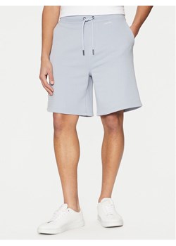 Calvin Klein Szorty sportowe Nano Logo K10K112689 Niebieski Regular Fit ze sklepu MODIVO w kategorii Spodenki męskie - zdjęcie 182595606