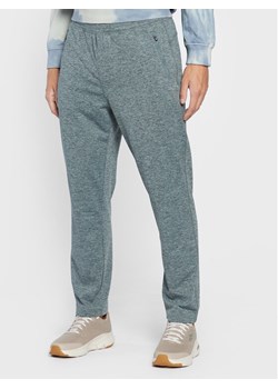 Skechers Spodnie dresowe Ultra Go M1PT77 Niebieski Tapered Fit ze sklepu MODIVO w kategorii Spodnie męskie - zdjęcie 182595857