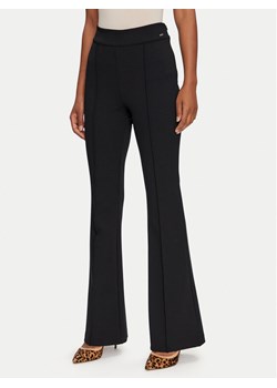 Guess Spodnie materiałowe W4YB01 KCBO2 Czarny Slim Fit ze sklepu MODIVO w kategorii Spodnie damskie - zdjęcie 182596119