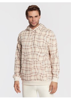 adidas Bluza Reveal Allover Print Graphic HK2749 Beżowy Regular Fit ze sklepu MODIVO w kategorii Bluzy męskie - zdjęcie 182596925