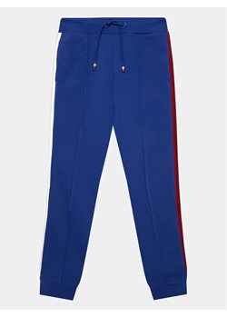 Tommy Hilfiger Spodnie dresowe Globral Stripes KB0KB08404 D Niebieski Regular Fit ze sklepu MODIVO w kategorii Spodnie chłopięce - zdjęcie 182597435