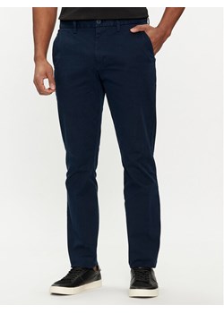 Tommy Jeans Chinosy Austin DM0DM19166 Granatowy Slim Fit ze sklepu MODIVO w kategorii Spodnie męskie - zdjęcie 182598748
