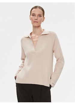 Calvin Klein Sweter Essential K20K206019 Beżowy Relaxed Fit - id: 0000302796991 - marki Calvin Klein - 182600396 Calvin Klein Sweter Essential K20K206019 Beżowy Relaxed Fit ze sklepu MODIVO w kategorii Swetry damskie - zdjęcie 182600396